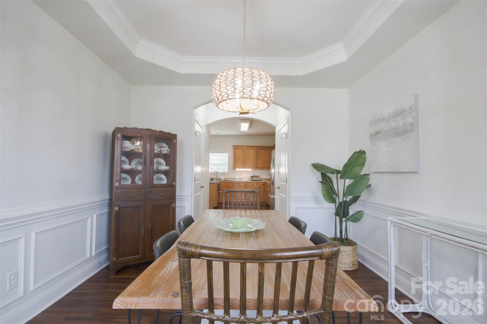 4030 Sunset Ridge Drive Rock Hill, SC 29732 - Photo 14 of 39 a dining room with furniture potted plants and wooden floor