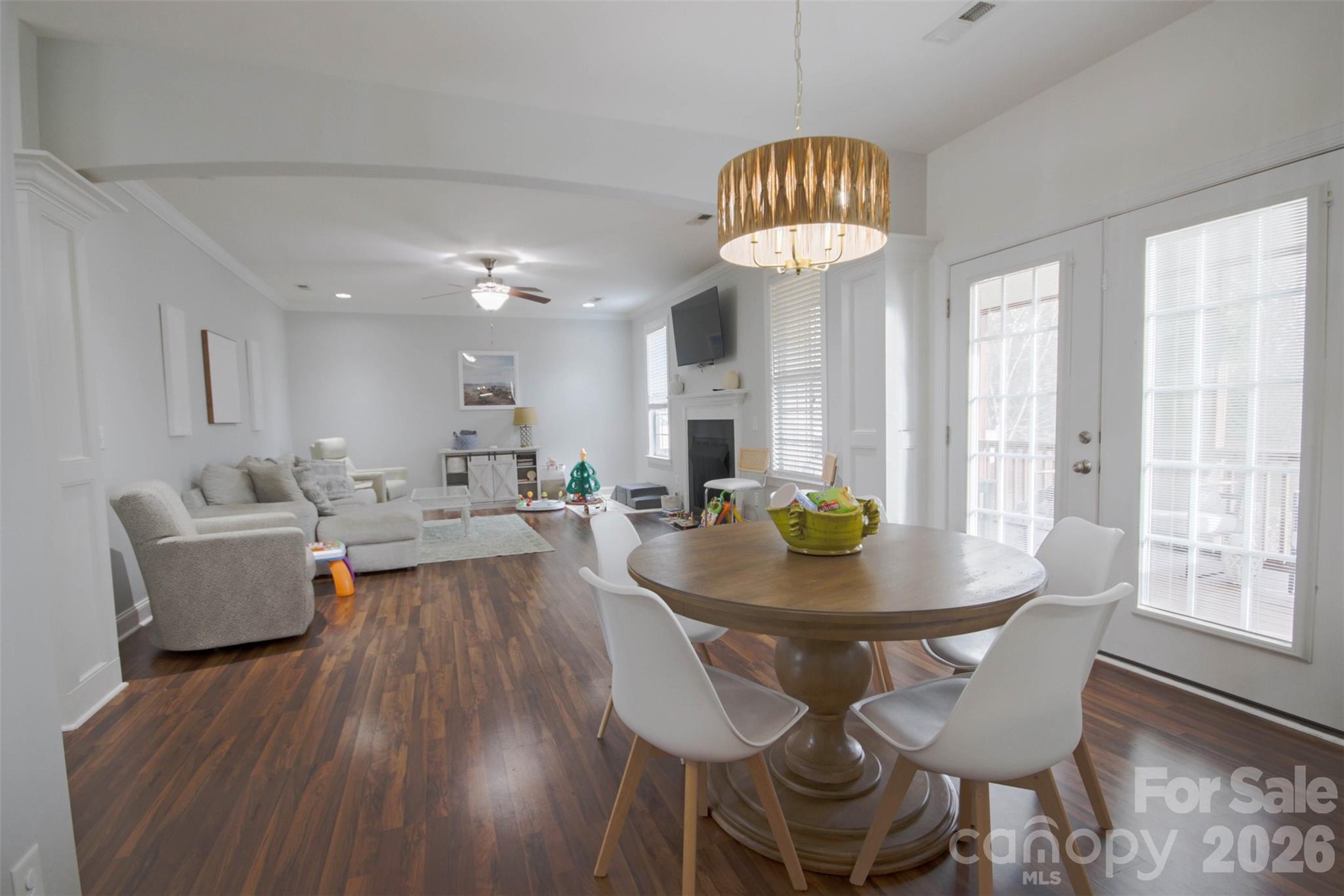 4030 Sunset Ridge Drive Rock Hill, SC 29732 - Photo 9 of 39 a view of a dining room with furniture wooden floor and chandelier