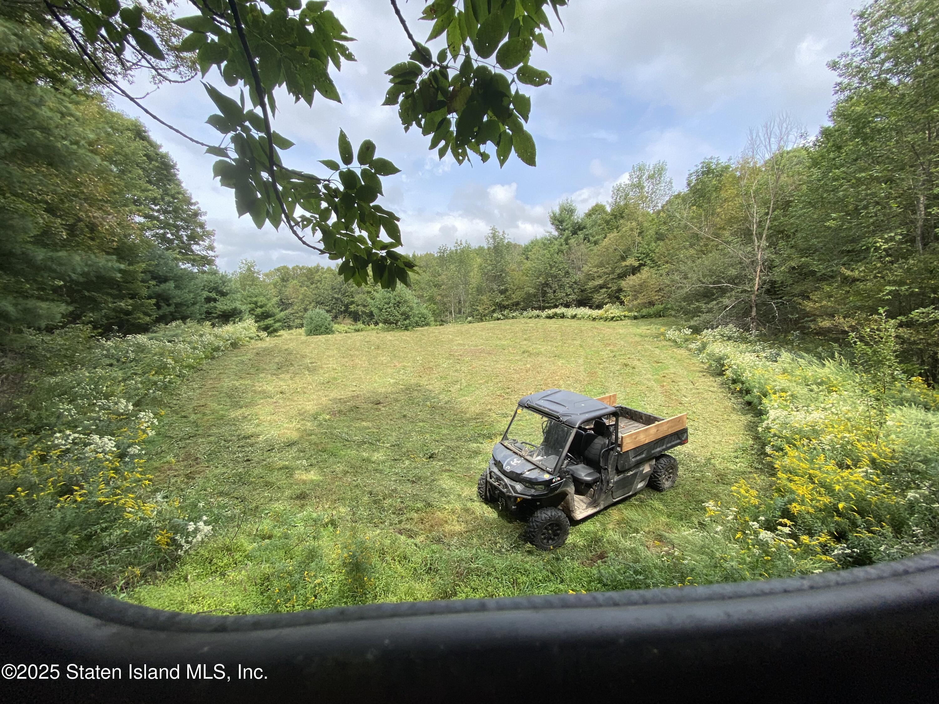 a view of a lake with an outdoor space