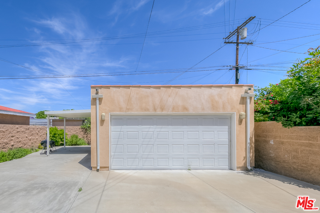 2816 Virginia Road Los Angeles, CA 90016 - Photo 22 of 29 a front view of a house with a garage