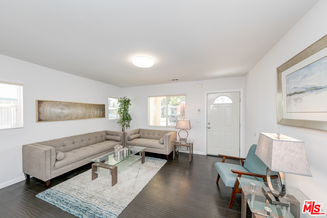 2816 Virginia Road Los Angeles, CA 90016 - Photo 6 of 29 a living room with furniture and wooden floor