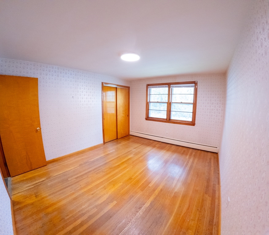 25 A White Avenue Worcester, MA 01605 - Photo 10 of 13 a view of a room that has a window in it