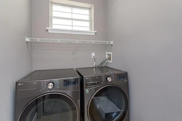 a utility room with dryer and washer