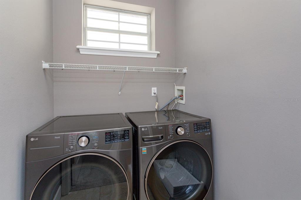 41 East Spruce Street Orlando, FL 32804 - Photo 21 of 24 a utility room with dryer and washer