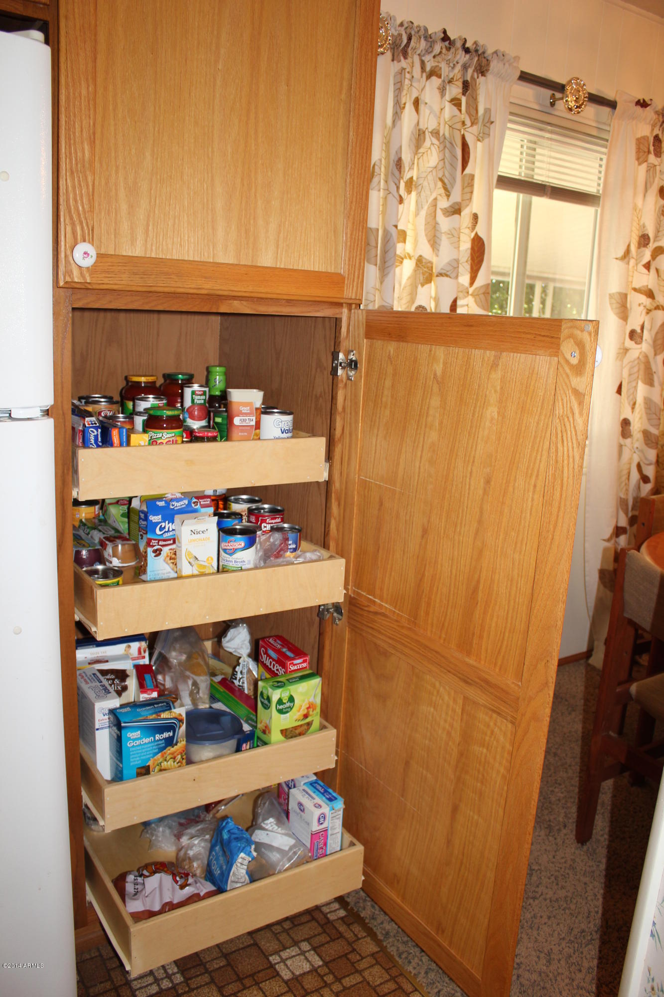 6539 West Hatcher Road Glendale, AZ 85302 - Photo 7 of 33 Pantry with Roll Outs