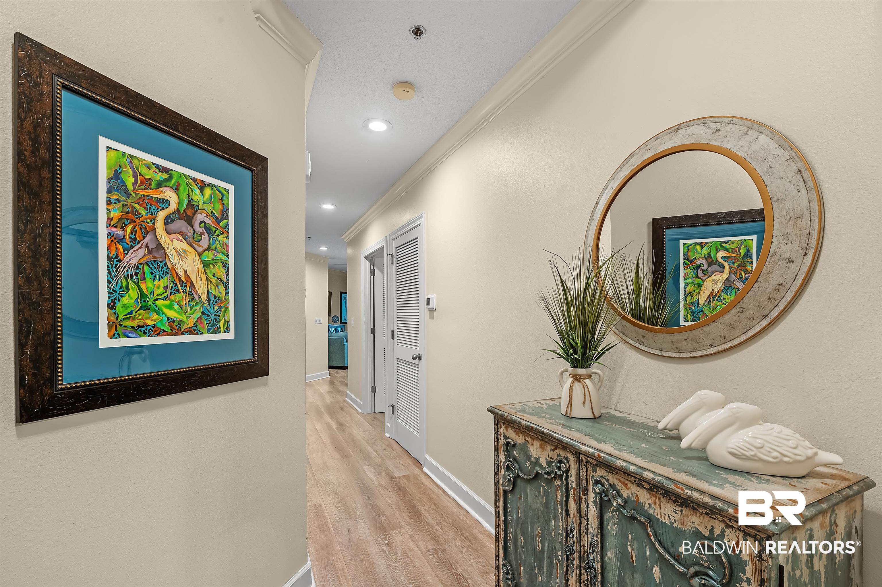 27582 Canal Road, Unit 2104 Orange Beach, AL 36561 - Photo 34 of 35 Hall featuring ornamental molding and light hardwood / wood-style floors