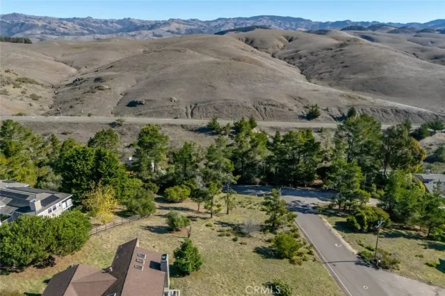 an aerial view of mountain with beach