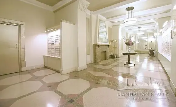 a living room with dining table and chairs