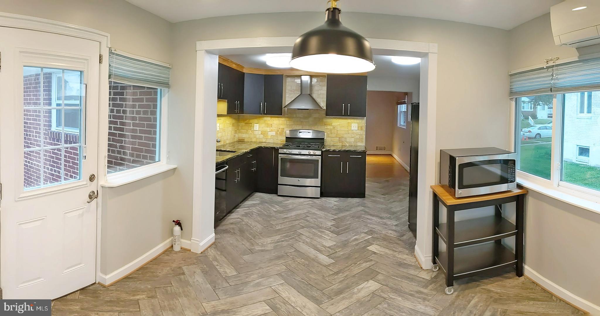 3516 Everton Street Silver Spring, MD 20906 - Photo 26 of 72 Kitchen and Rear Door to Patio