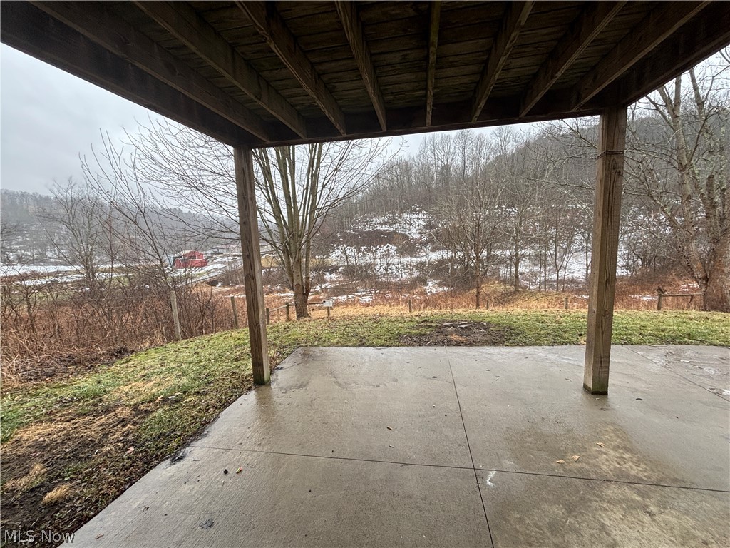4301 Steubenville Road Southeast Amsterdam, OH 43903 - Photo 21 of 27 Concrete patio off of basement