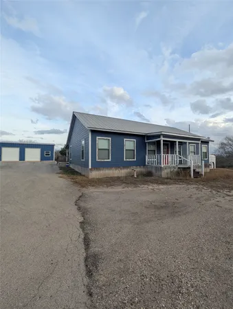 a front view of house with yard