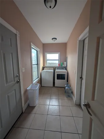 a view of washer and dryer with washer and dryer