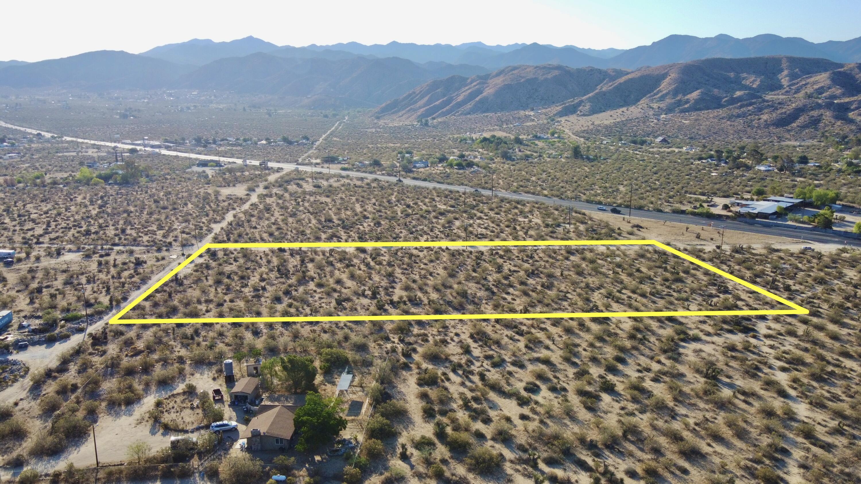 9792 Fobes Road Morongo Valley, CA 92256 - Photo 3 of 3 a view of a street with a mountain view
