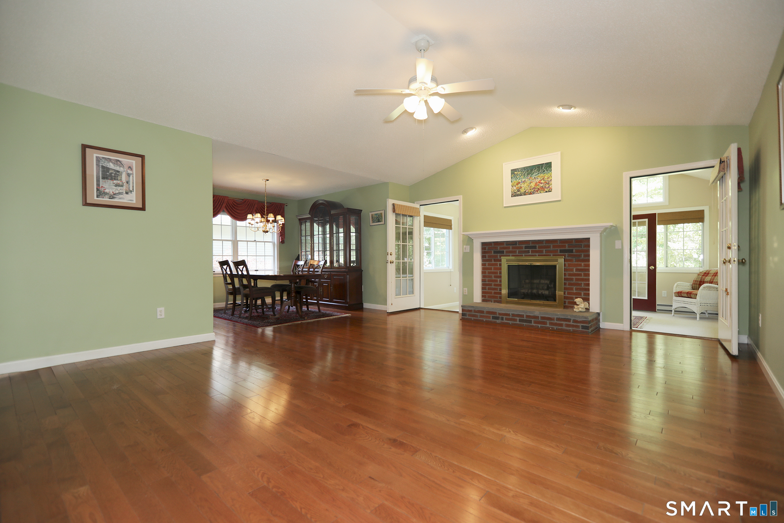 632 Locksmith Road, Unit 632 Windsor, CT 06095 - Photo 2 of 21 Beautiful hardwood floors and a wood-burning fireplace