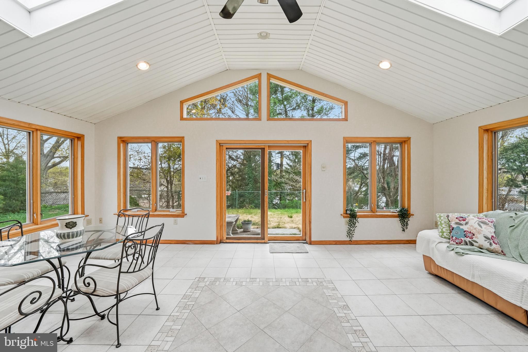 574 General Armstrong Road King of Prussia, PA 19406 - Photo 18 of 52 Walk Through The Kitchen To The Beautiful Sunroom