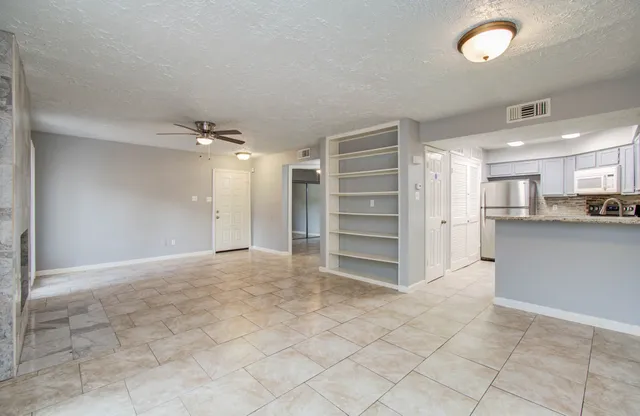 a view of kitchen and window