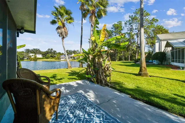 a view of multiple houses with yard