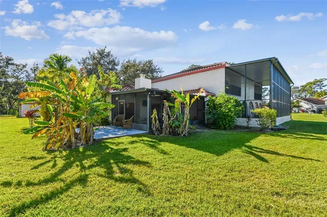 a view of a lake with houses in the background