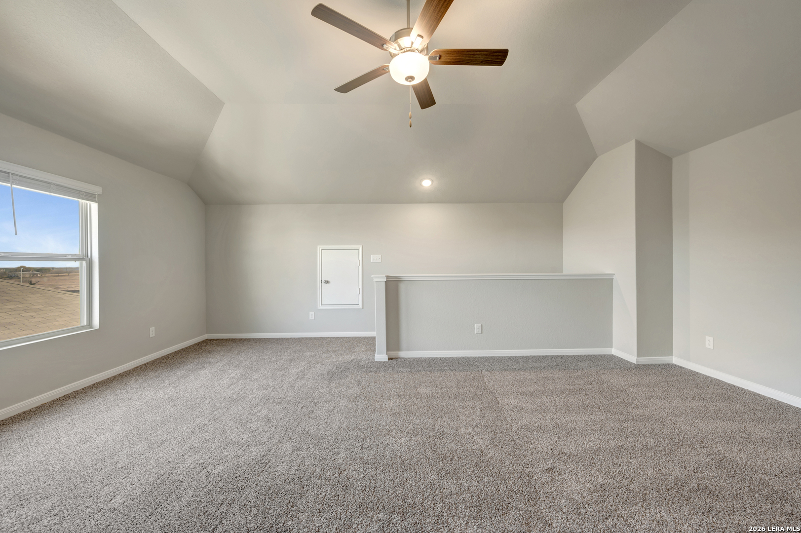 10330 Goodison Drive Converse, TX 78109 - Photo 28 of 42 an empty room with a empty space and a ceiling fan