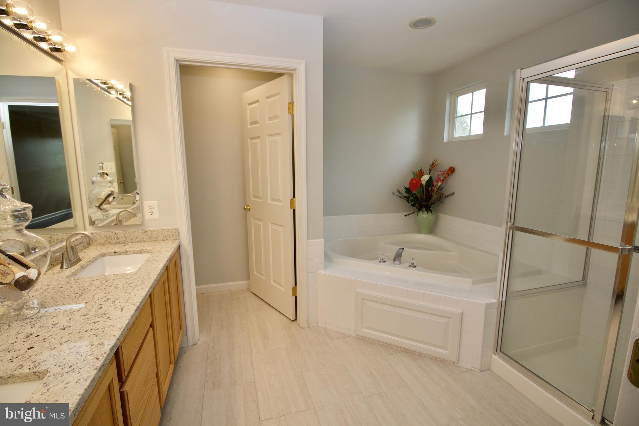 1805 Addison Court Frederick, MD 21701 - Photo 21 of 42 Master bathroom with Jacuzzi style soaking tub