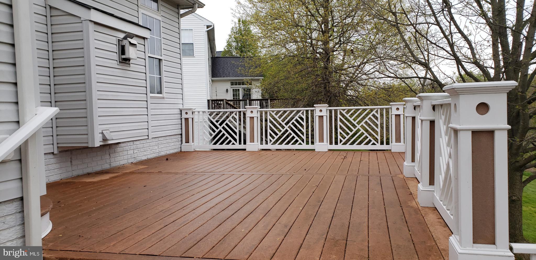 1805 Addison Court Frederick, MD 21701 - Photo 27 of 42 Upper level of deck from lower level view