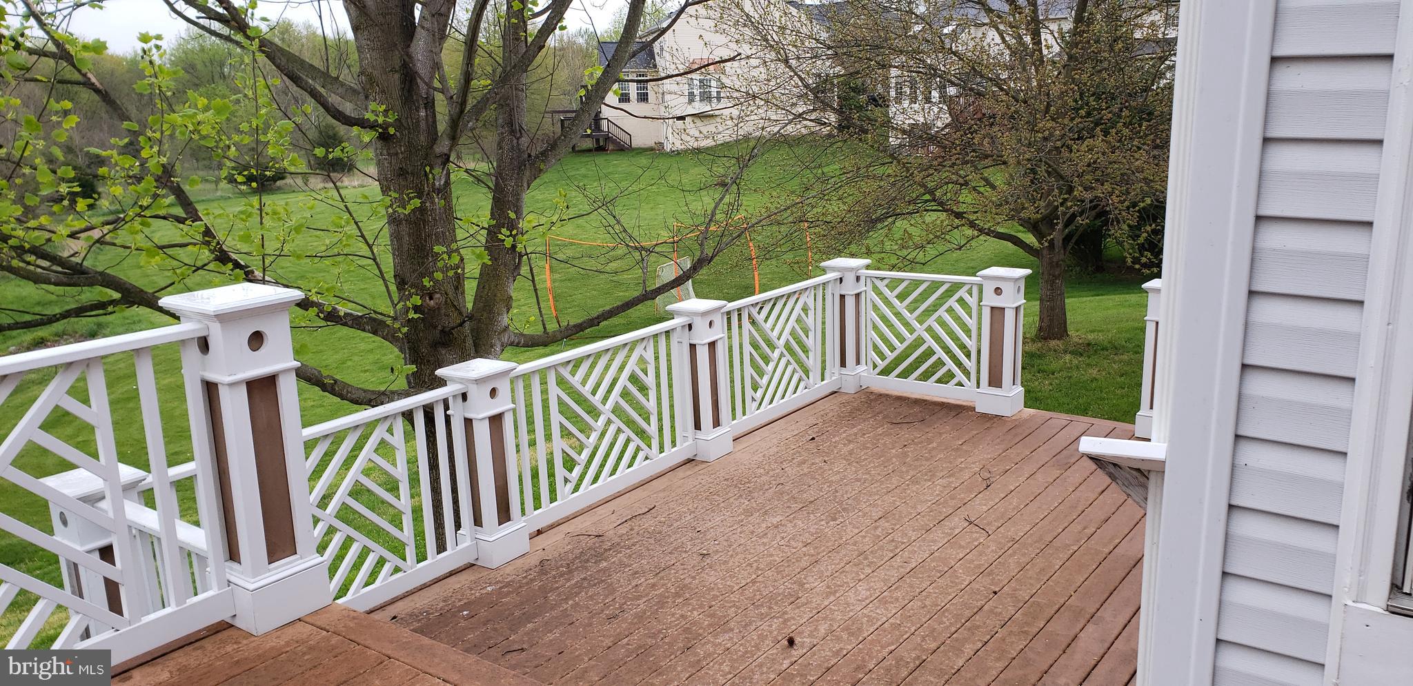 1805 Addison Court Frederick, MD 21701 - Photo 28 of 42 Lower level deck viewed from upper deck