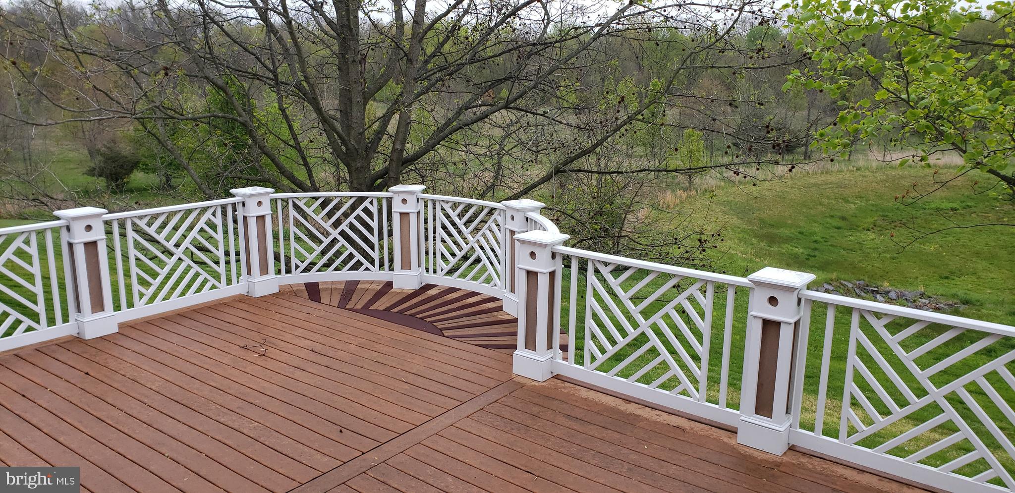 1805 Addison Court Frederick, MD 21701 - Photo 29 of 42 View of upper level deck from sun room entrance