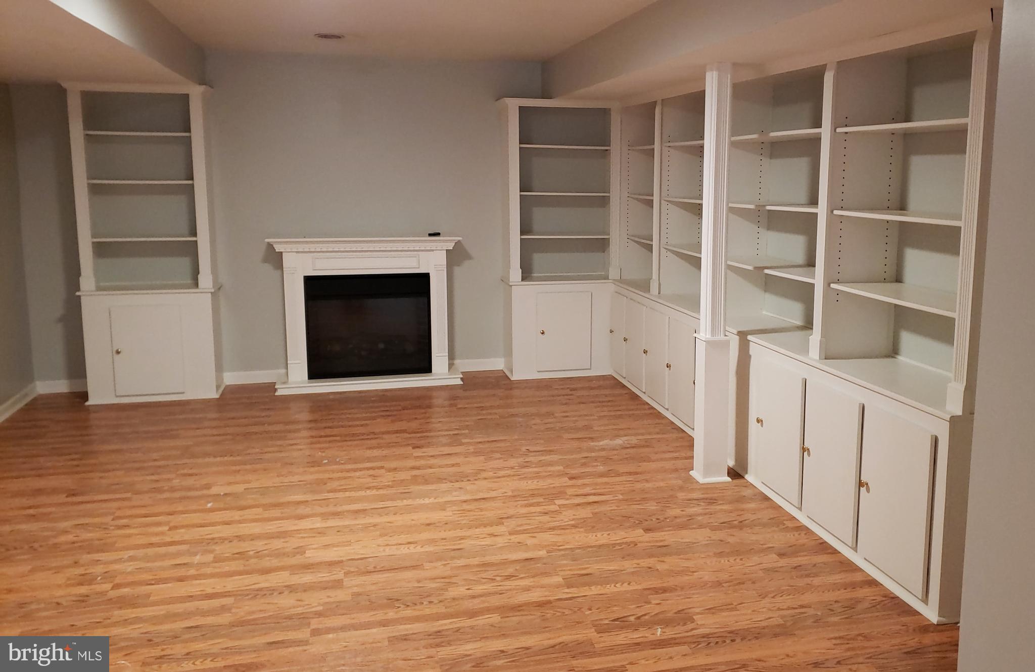 1805 Addison Court Frederick, MD 21701 - Photo 30 of 42 basement with natural gas fire place w/built ins