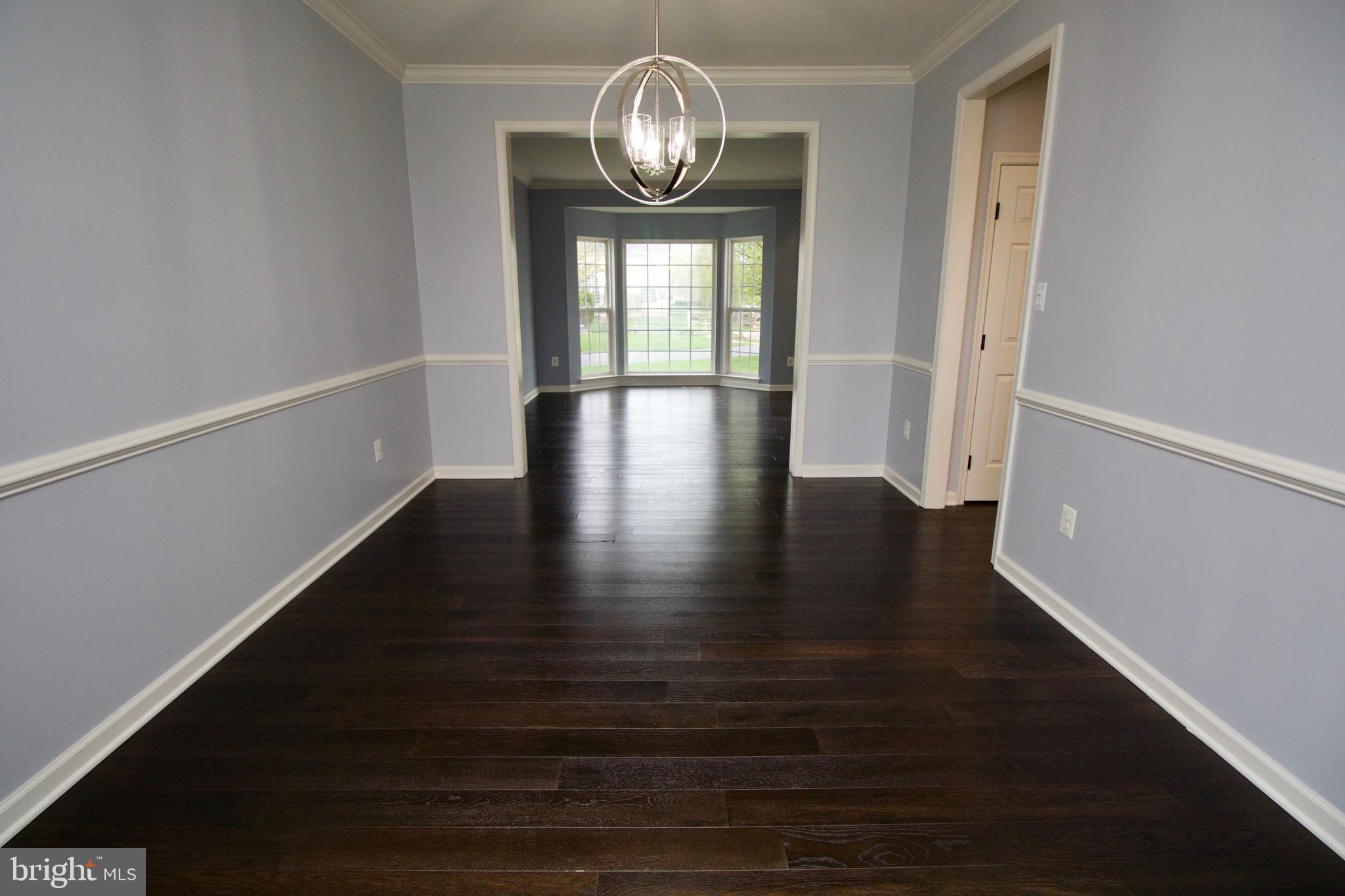 1805 Addison Court Frederick, MD 21701 - Photo 8 of 42 Dinning room with view of the living room