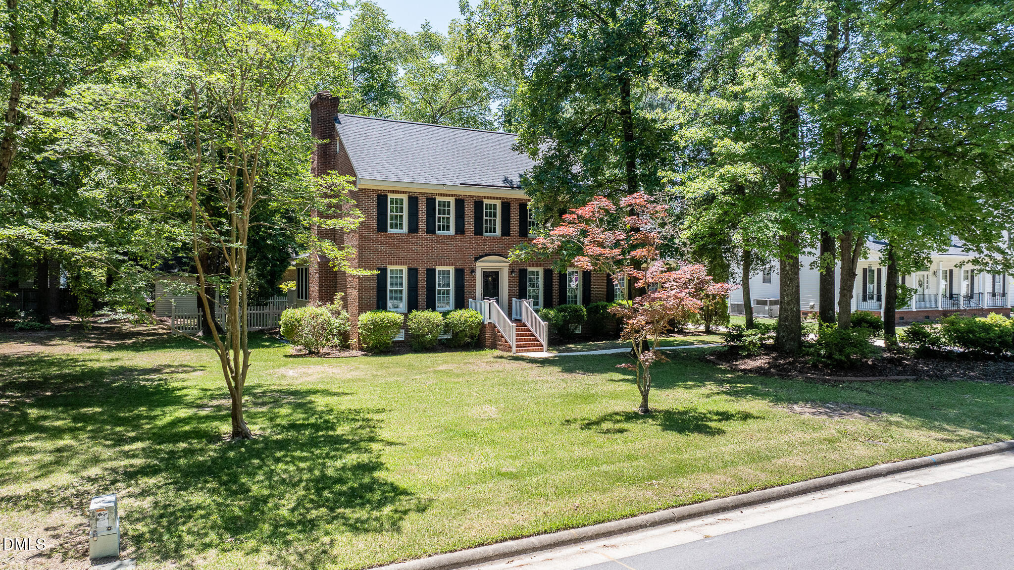 1215 Cambridge Road Northwest Wilson, NC 27896 - Photo 2 of 54 front view of a house with a yard