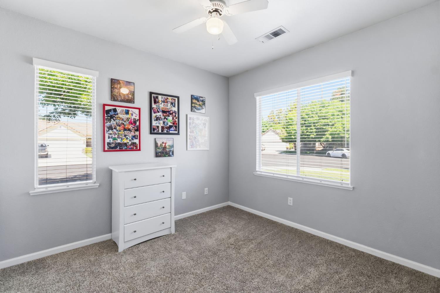 1757 Homestead Way Lemoore, CA 93245 - Photo 18 of 35 a view of room with cabinet and windows
