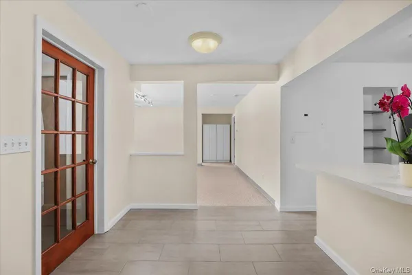 a view of entryway with furniture and entryway