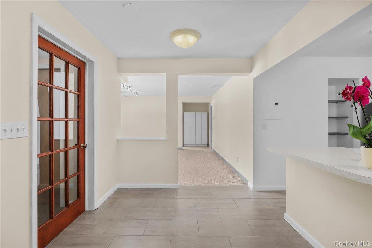 a view of entryway with furniture and entryway