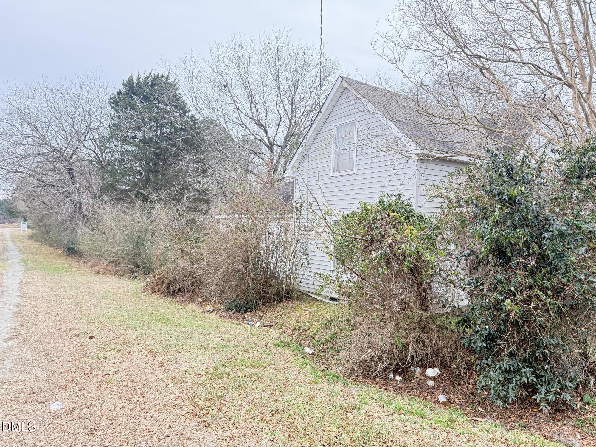 103 Howard Harris Road Franklinton, NC 27525 - Photo 11 of 12 a view of a dry yard covered with snow in front of house