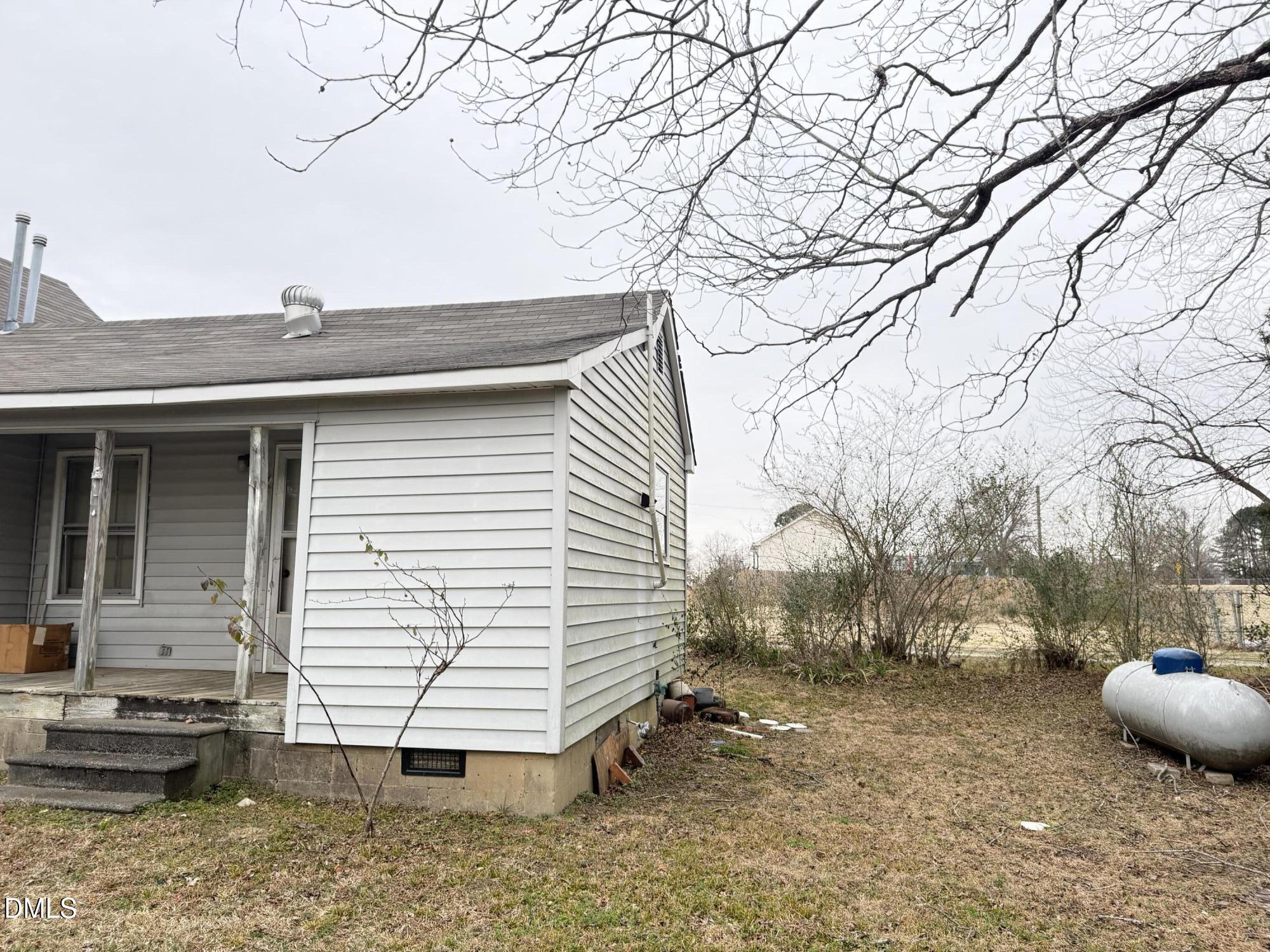 103 Howard Harris Road Franklinton, NC 27525 - Photo 12 of 12 a view of a house with a yard and tree s