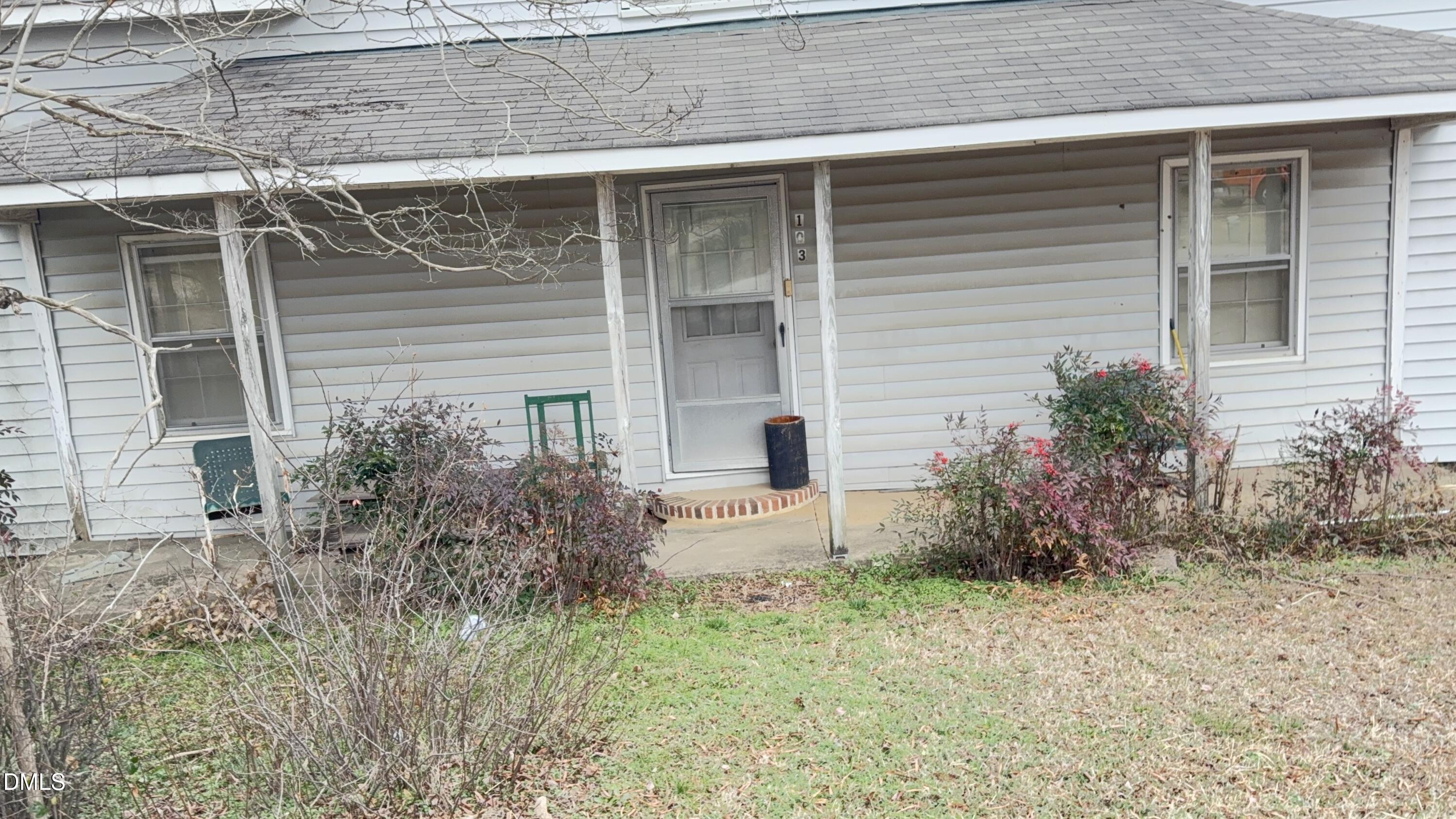103 Howard Harris Road Franklinton, NC 27525 - Photo 5 of 12 a front view of a house with garden