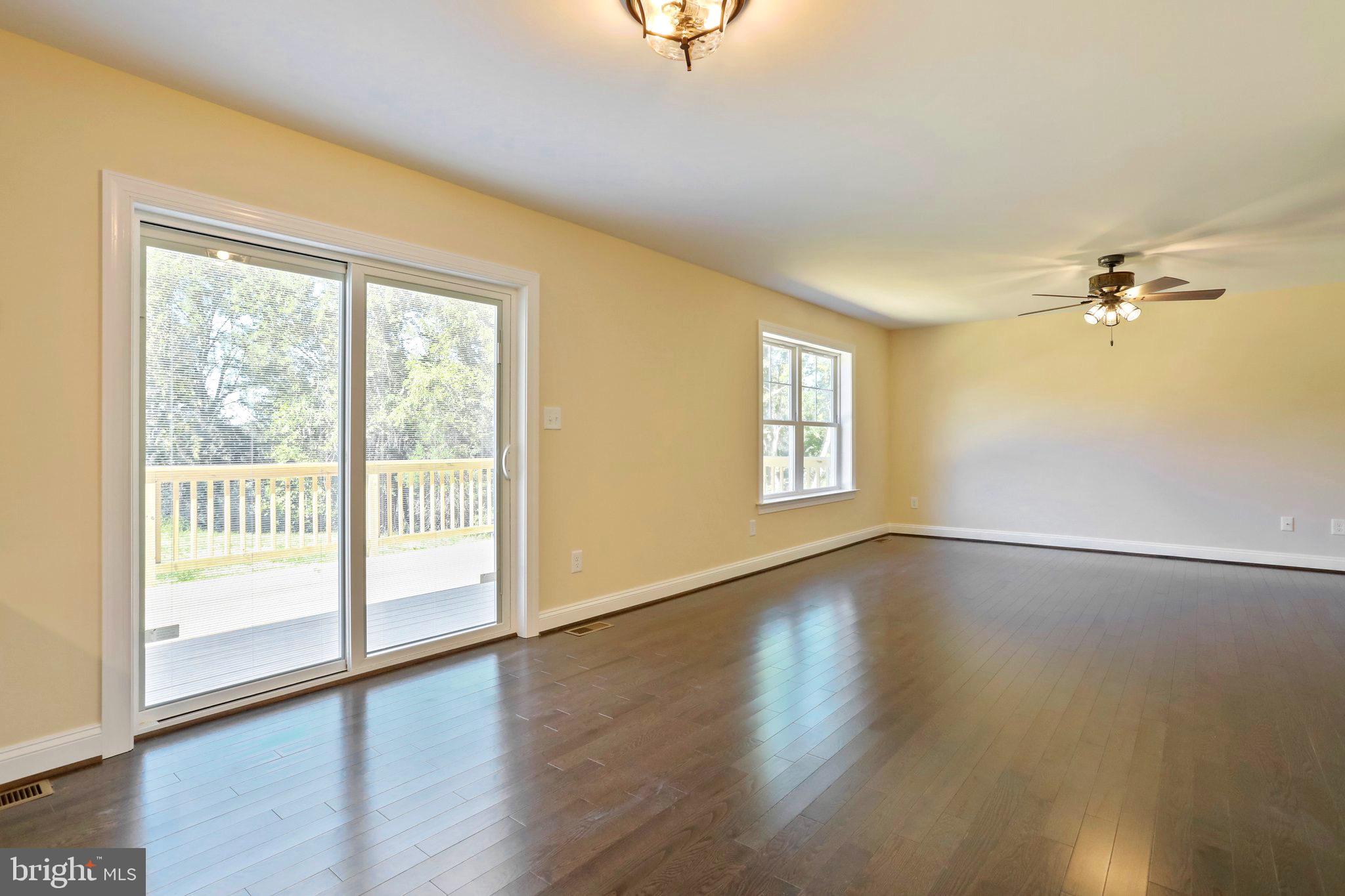3215 Rockland Road Front Royal, VA 22630 - Photo 16 of 55 Family room leading to amazing rear yard