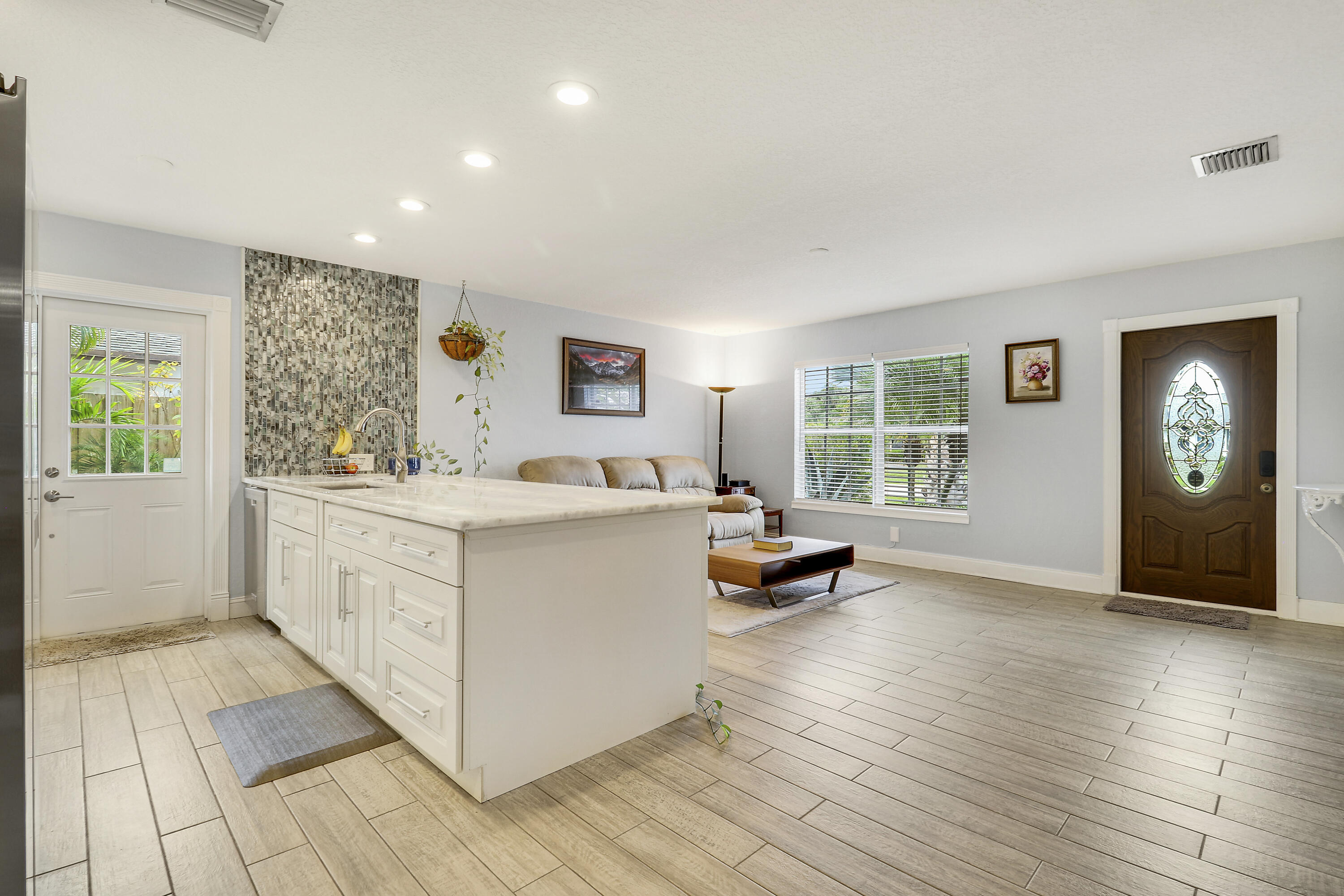 503 North Perry Avenue Jupiter, FL 33458 - Photo 7 of 32 Living and Kitchen from Dining