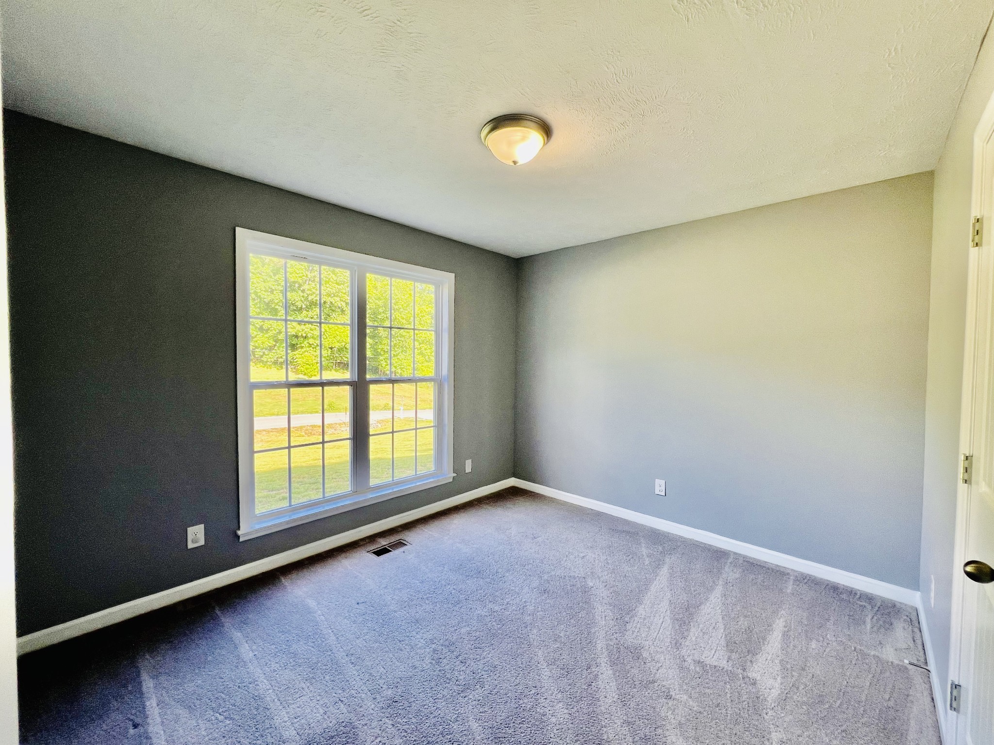 770 Bunker Hill Road Pulaski, TN 38478 - Photo 14 of 26 an empty room with a window