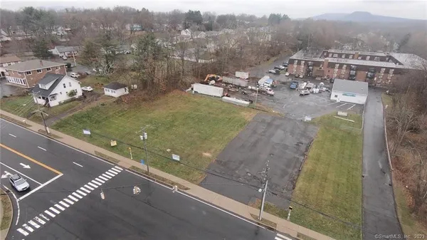 a view of a pool with a yard