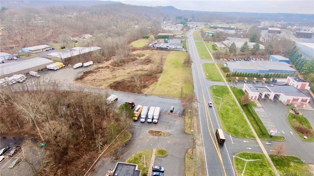 1280 East Main Street Meriden, CT 06450 - Photo 8 of 9 an aerial view of residential houses with outdoor space