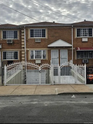 a front view of a house with a porch