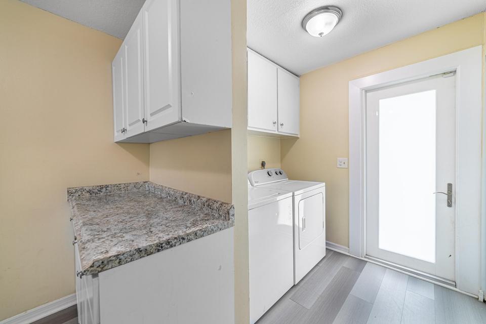 516 Nathan Hale Road, Unit 1 West Palm Beach, FL 33405 - Photo 10 of 24 Unit1-Kitchen-Laundry