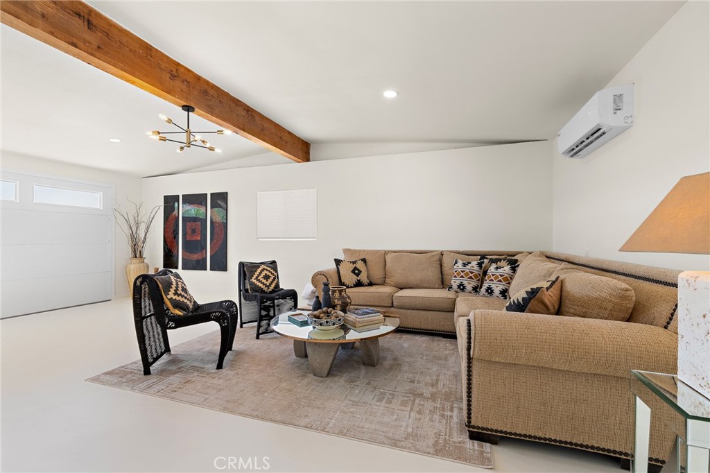 62420 Canterbury Street Joshua Tree, CA 92252 - Photo 25 of 50 a living room with furniture and a wooden floor