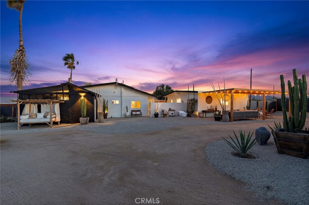 62420 Canterbury Street Joshua Tree, CA 92252 - Photo 46 of 50 a view of a house with a patio