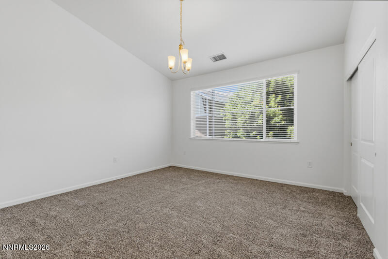 285 Mark Jeffrey Lane Reno, NV 89503 - Photo 13 of 20 an empty room with windows