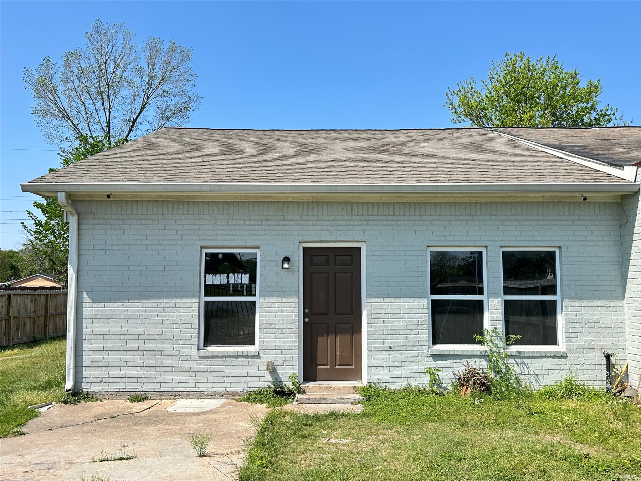 12703 West Hardy Road Houston, TX 77037 - Photo 5 of 29 a front view of a house