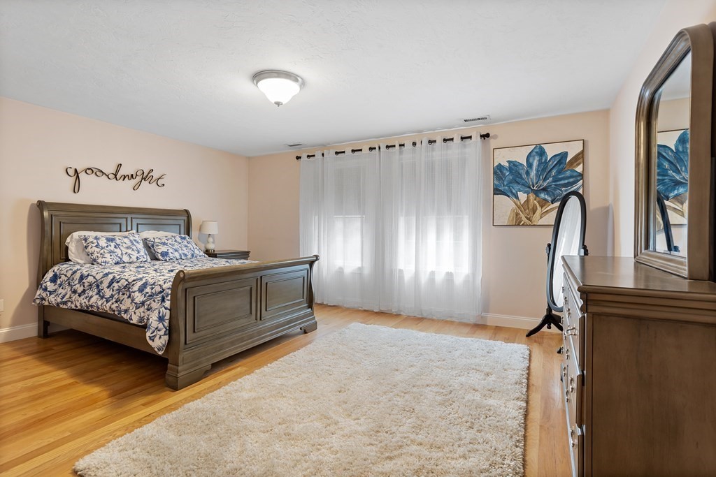 215 Rangeway Road, Unit 33 Billerica, MA 01862 - Photo 24 of 42 a bedroom with a bed and a window
