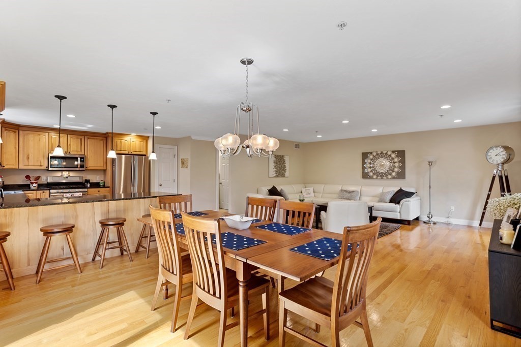 215 Rangeway Road, Unit 33 Billerica, MA 01862 - Photo 8 of 42 a view of a dining room with furniture
