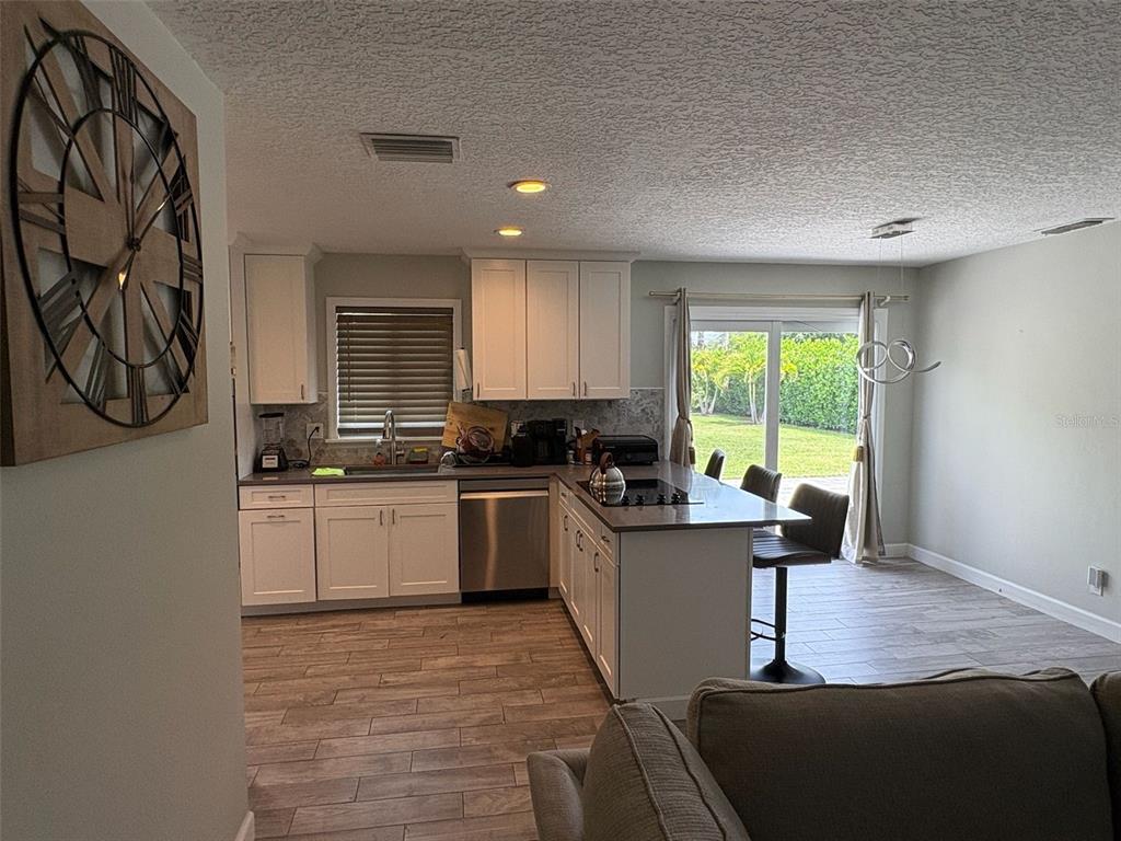 125 Southeast 6th Avenue Boynton Beach, FL 33435 - Photo 14 of 27 a kitchen with a sink cabinets and window